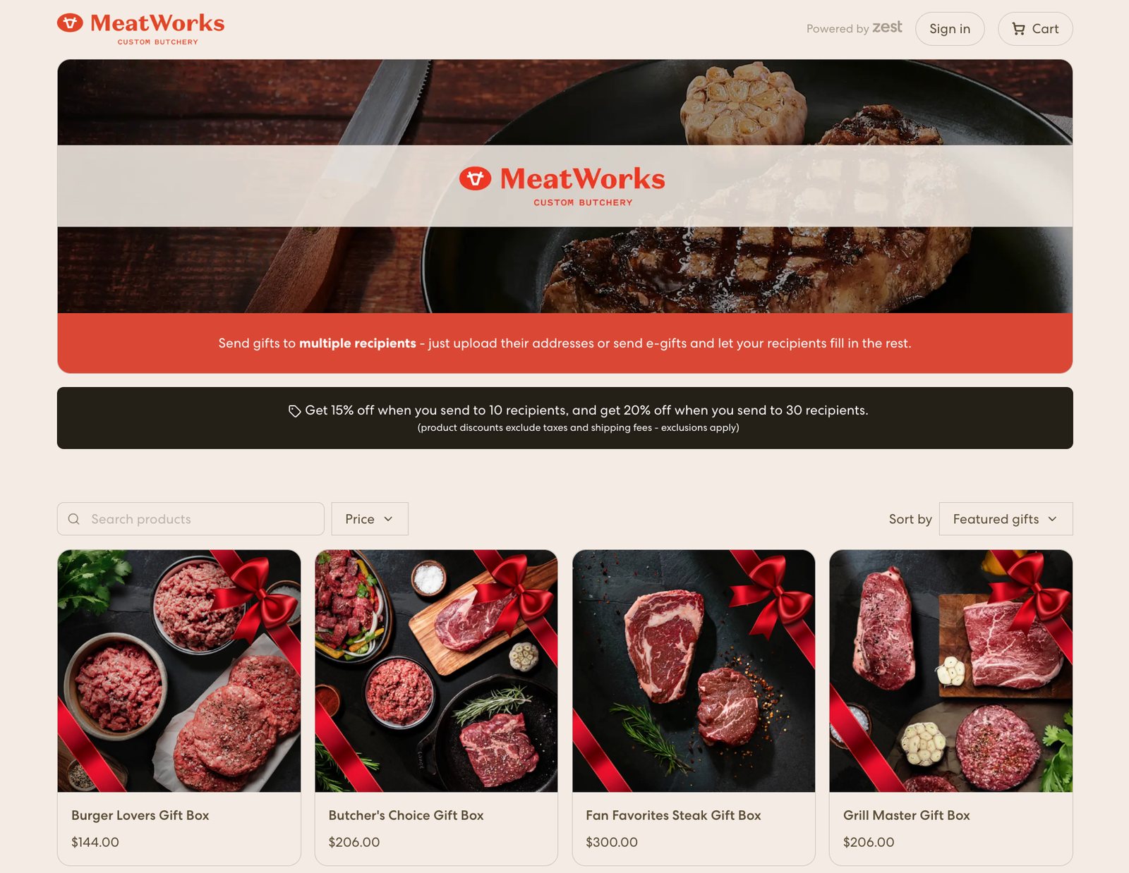 The MeatWorks gifting storefront powered by Zest, showing a multi-recipient sending banner, volume discount bar and a grid of gift boxes from $144 to $300